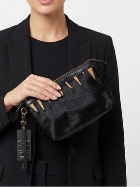 Cavalcanti Black Pony Hair Wristlet with Gold Accent Detail